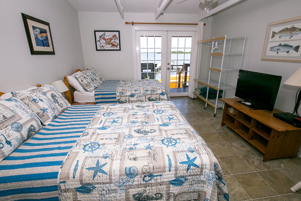 Two full sized beds in in-law suite offer water view snoozing