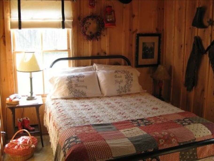 Cuddle up in the cowboy room. The cabin offers 2 bedrooms each with a queen.