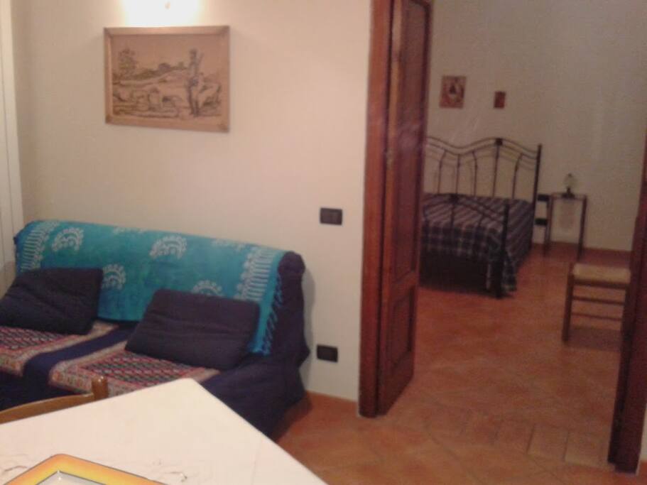 CUCINA CON DIVANO LETTO