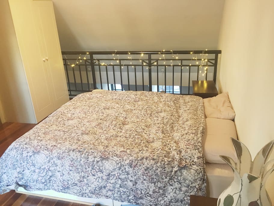 master bedroom with mezzanine balcony