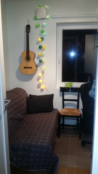 Guest room with sleeping couch