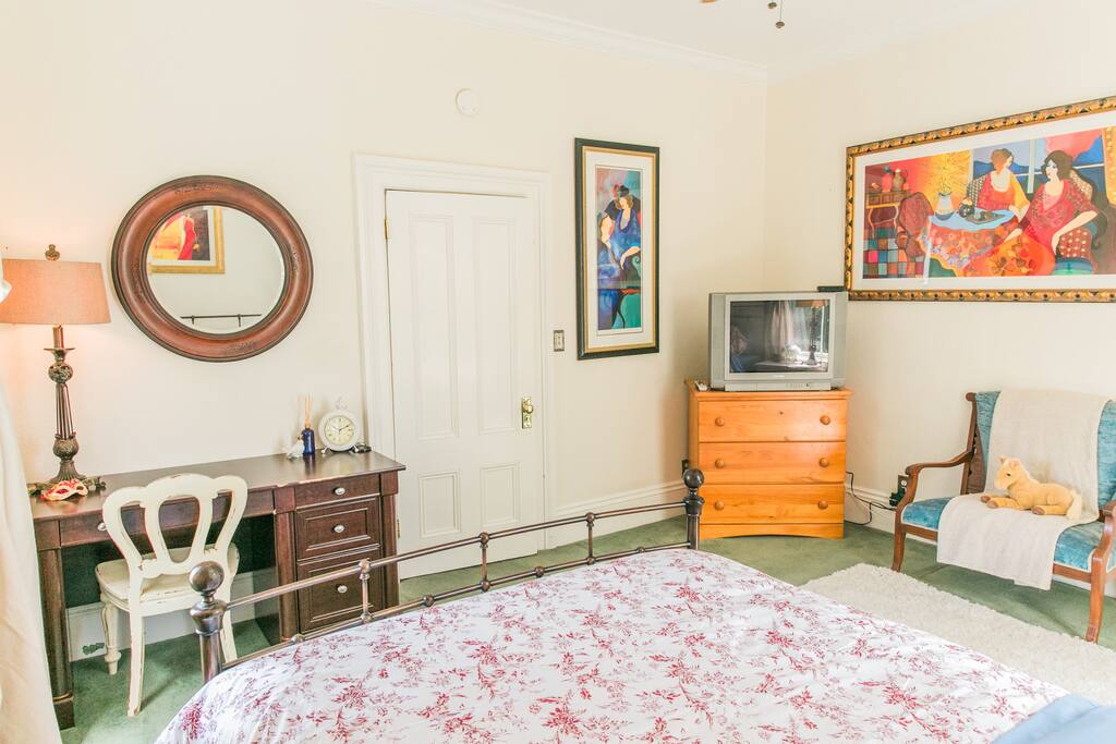 The room has been temporarily rearranged with a chaise lounge added.