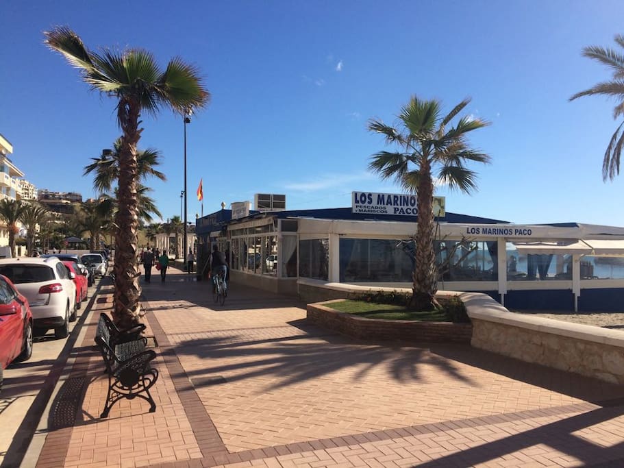 Boulevard in front of appartment and restaurant
