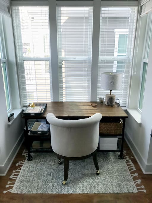 Spacious desk available for those traveling with work.