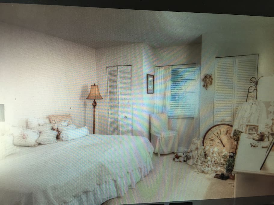 Twin beds can either be kept together to form a king or pulled apart for two twins. Separate pull-out sofa chair in front room available for third person.