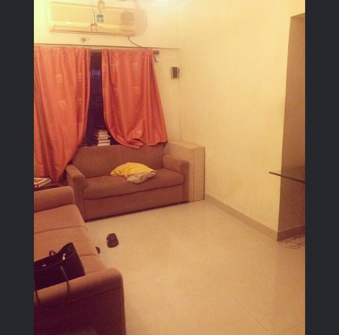Hall, table and TV opposite side