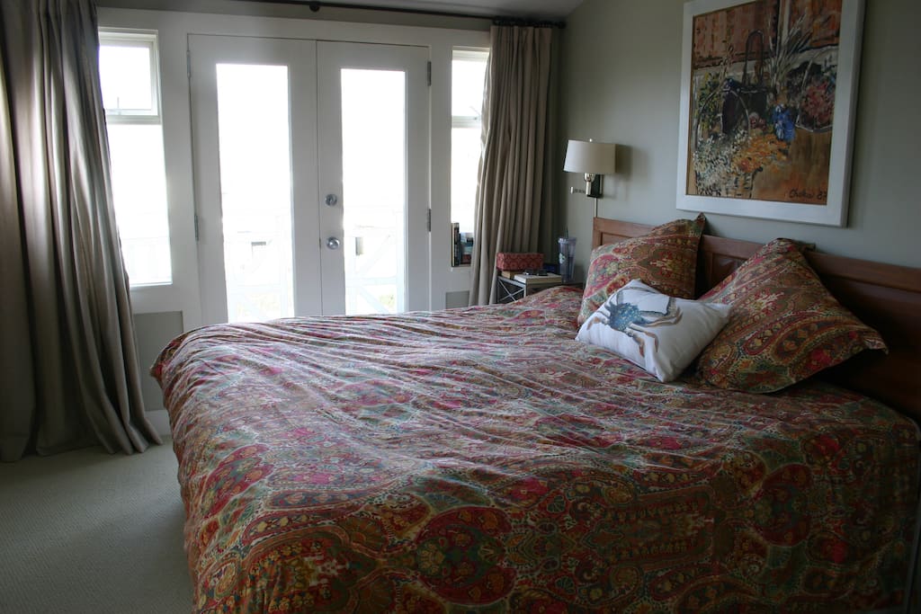 Master bedroom with small balcony overlooking english bay....room for dinner for two!