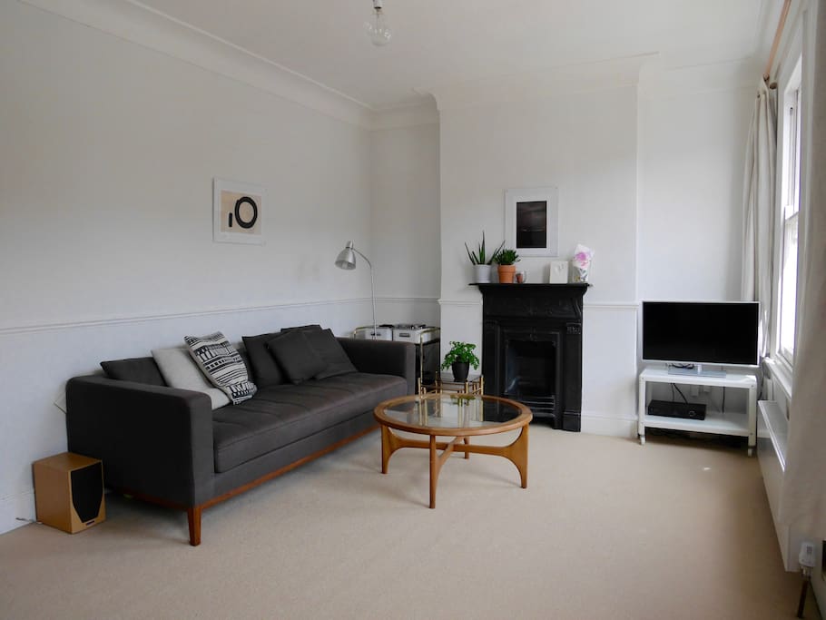 Cosy sofa + comfy for sleeping. Door can be closed to create private sleeping area.