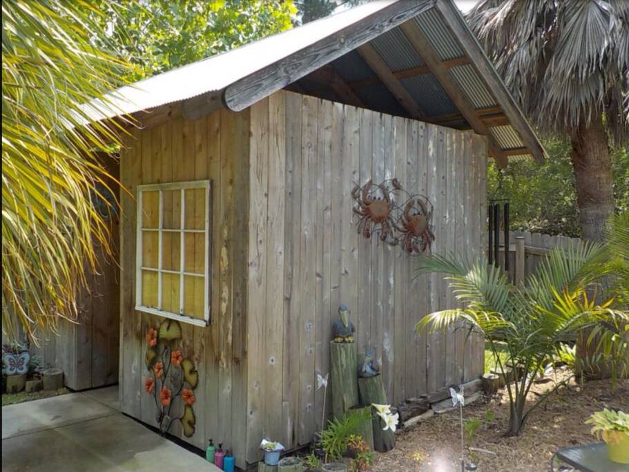 Pool shed with changing area, shower, & toilet