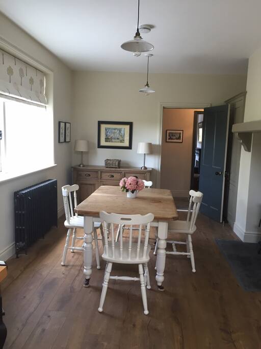 The kitchen has a woodburning stove