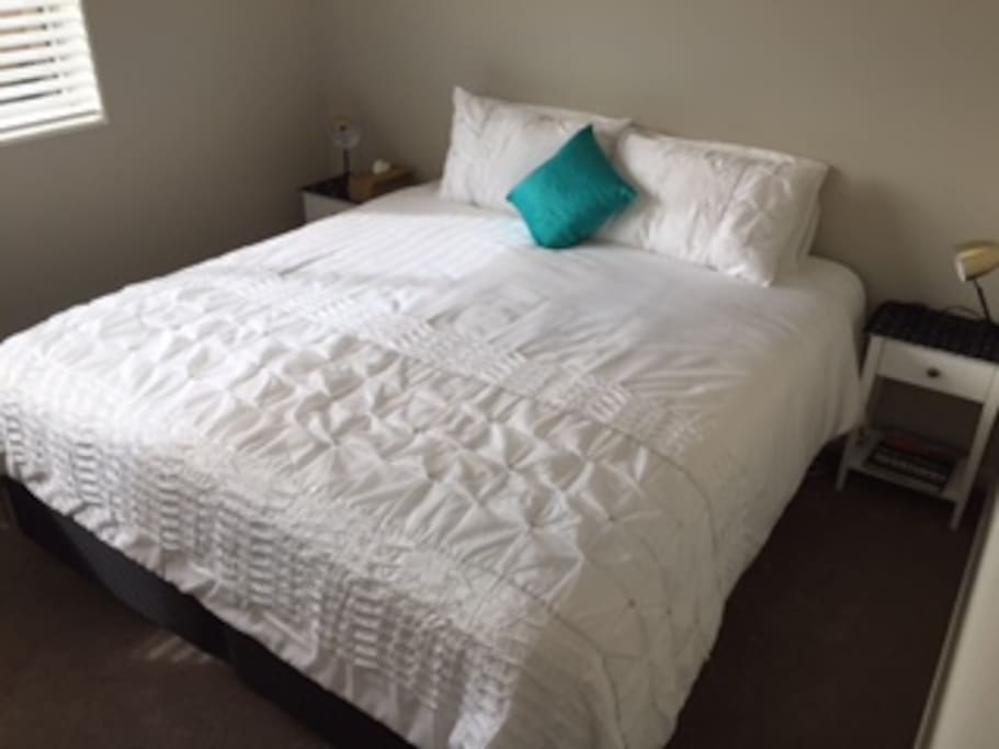 Private guest room with King-size bed + ensuite and small lounge.