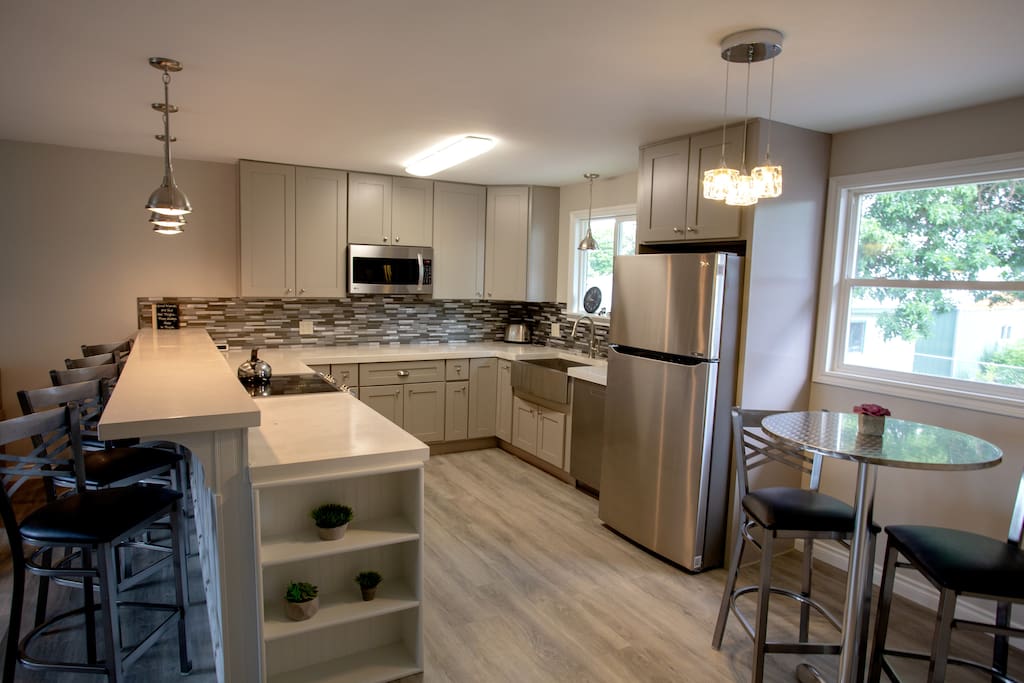 Upgraded LG appliances, concrete countertops, trash compactor, Microwave/convectional