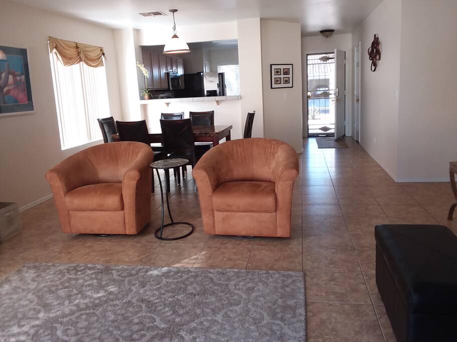 Living room looking toward dining room, kitchen and entry.