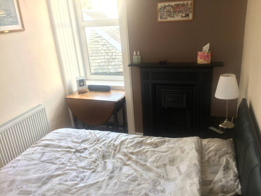 bedroom with original fireplace (centrally heated)