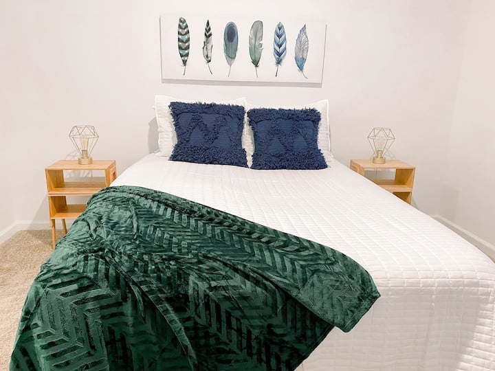 Lounge in our guest bedroom with a comfy throw blanket!