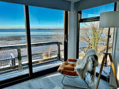 Luxury seaside lodge just feet from the sea.