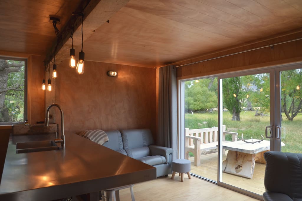 Open plan living area out onto deck