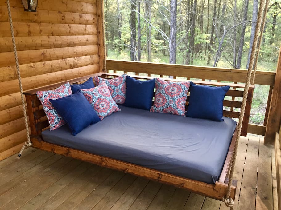 Relaxing bed swing on back porch
