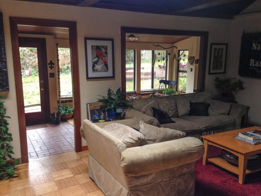 The front door, sun room and living room.