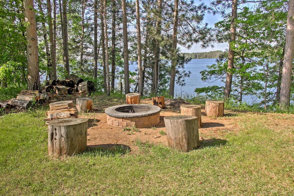 Tucked away among the white pines, this 3,100-square-foot home sleeps 8 and features stunning lake views from almost everywhere in the house.