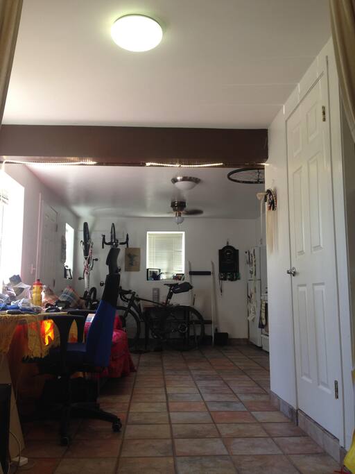 i need to tidy up but this is the desk/ living space with a dining table/ couch
