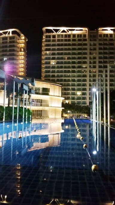 Paris Hilton Beach Club at night.