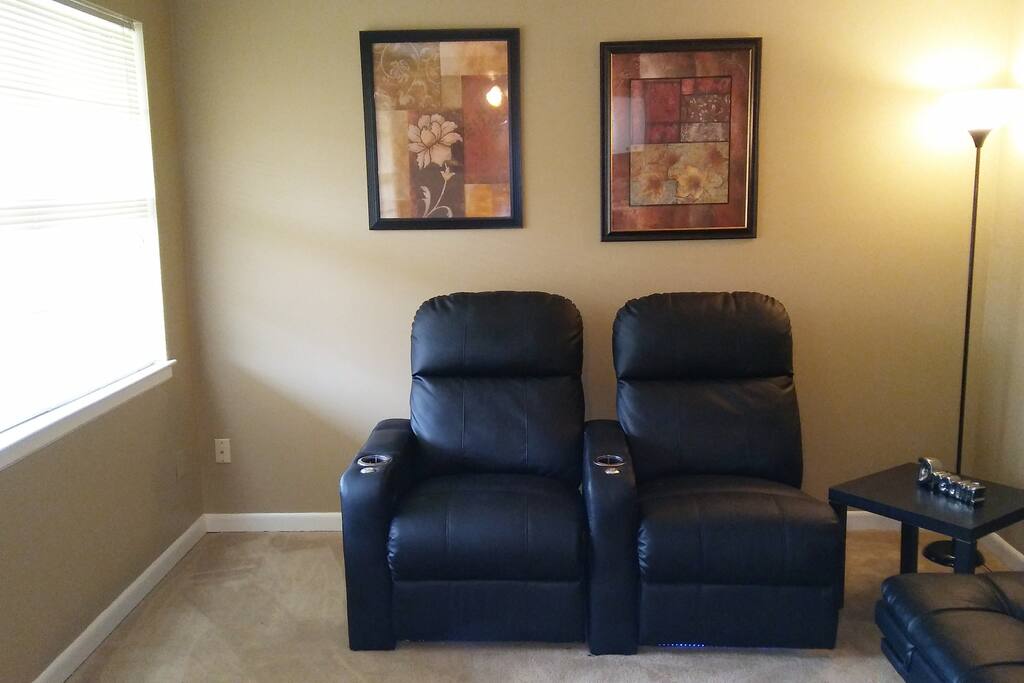 Sit back in the Leather Theater Chairs