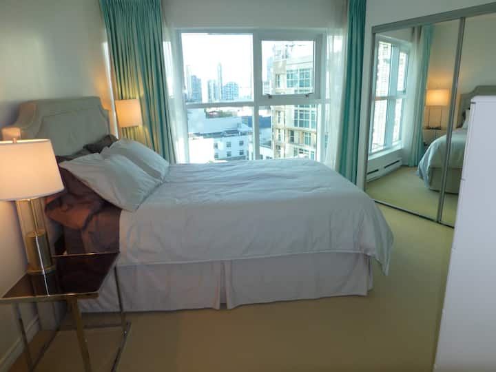 Master bedroom overlooking Homer street. Lots of closet space.