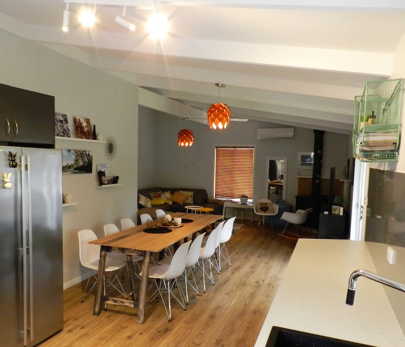 3m long bespoke dining table and side by side fridge