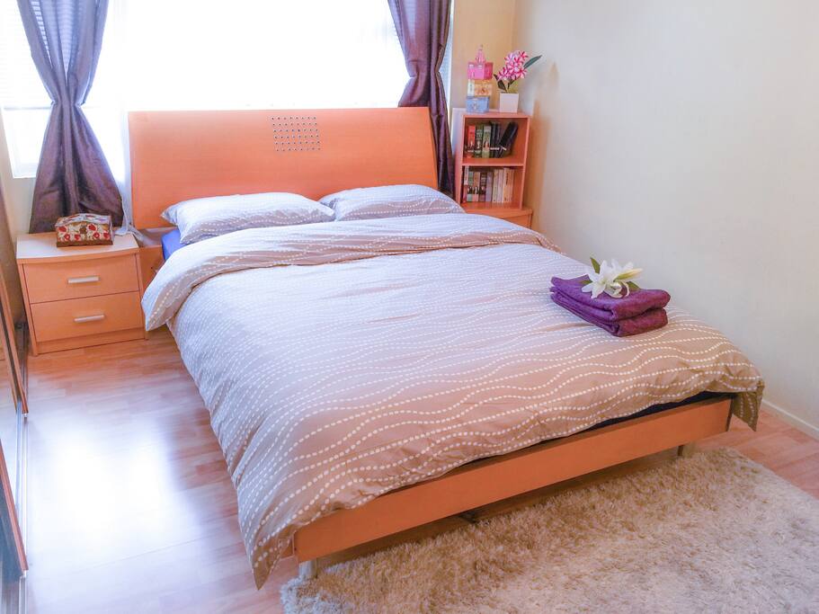 Bedroom - Queen bed - 3 large built in wardrobe on the left, fresh bed linen