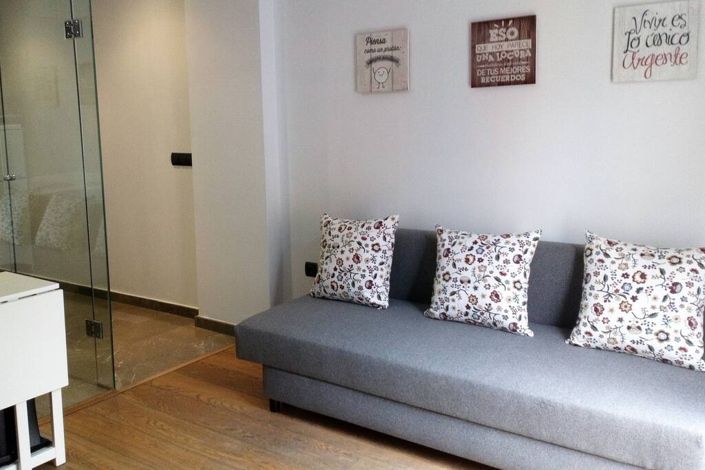 Salón con sofá cama