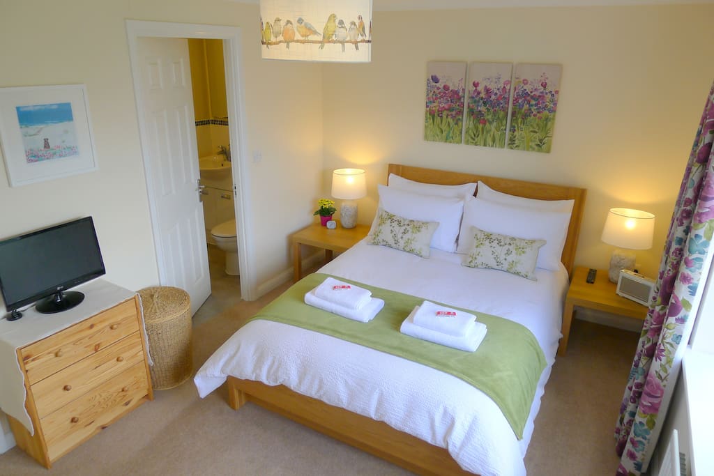 Very quiet and comfortable double room with TV, DAB radio, clock and hair dryer. Exclusive use of bright and modern en-suite shower room. The Airfield B&B - Duxford, Cambridge.