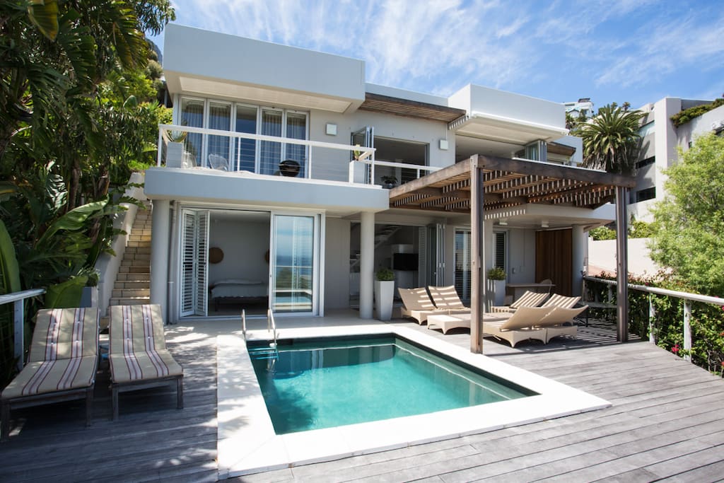 Pool and outdoor deck with full sea views