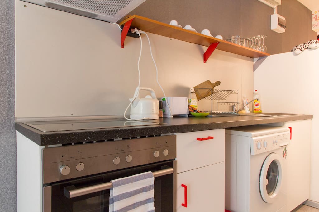 Comfortable equipped kitchen and washer