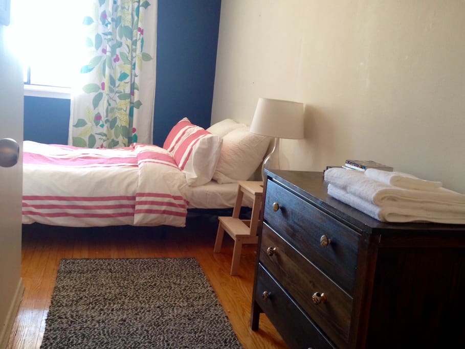 Second bedroom with double bed on the second floor.