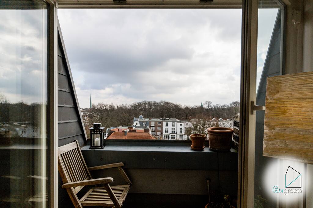 A wonderful place in summer! Enjoy the wonderful view over the city on the small balcony.
