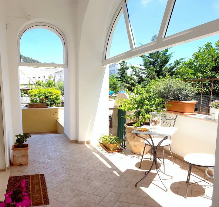 Portico - guests passageway area -room 3 access with reserved table