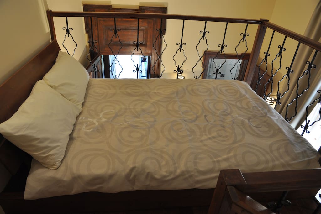 The upstairs bed
