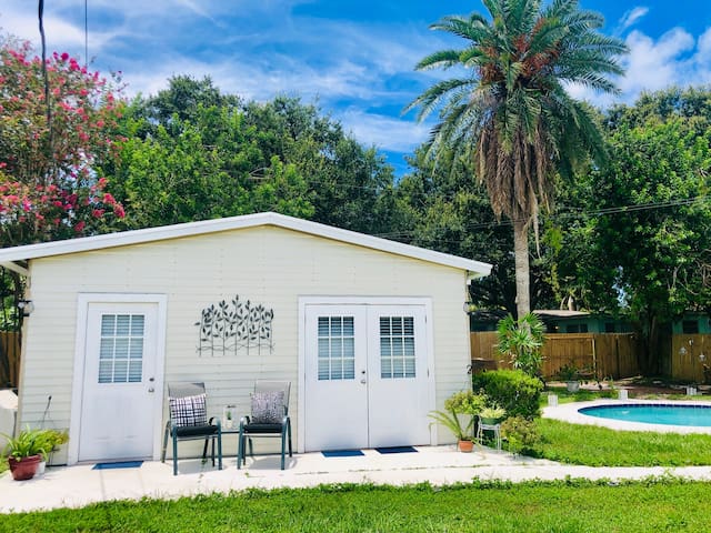 Private tropical garden entire home near the beach