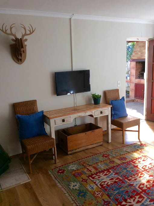 Spacious main living area with access to covered braai area