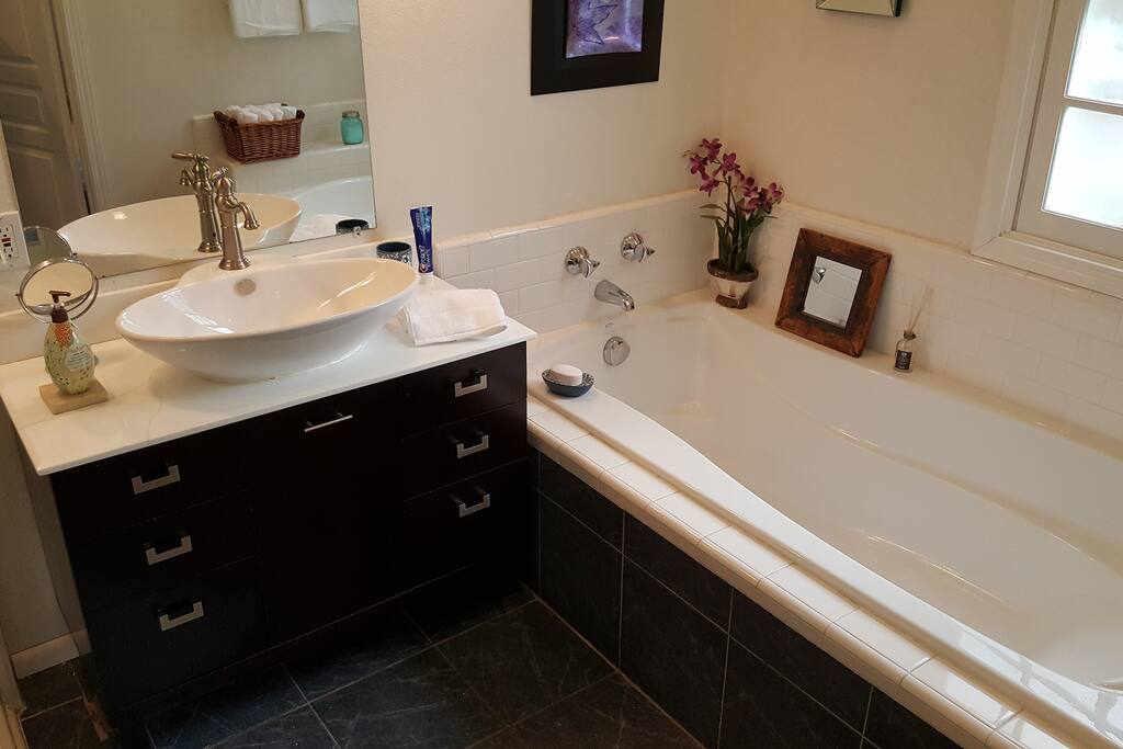 private bathroom with shower and tub