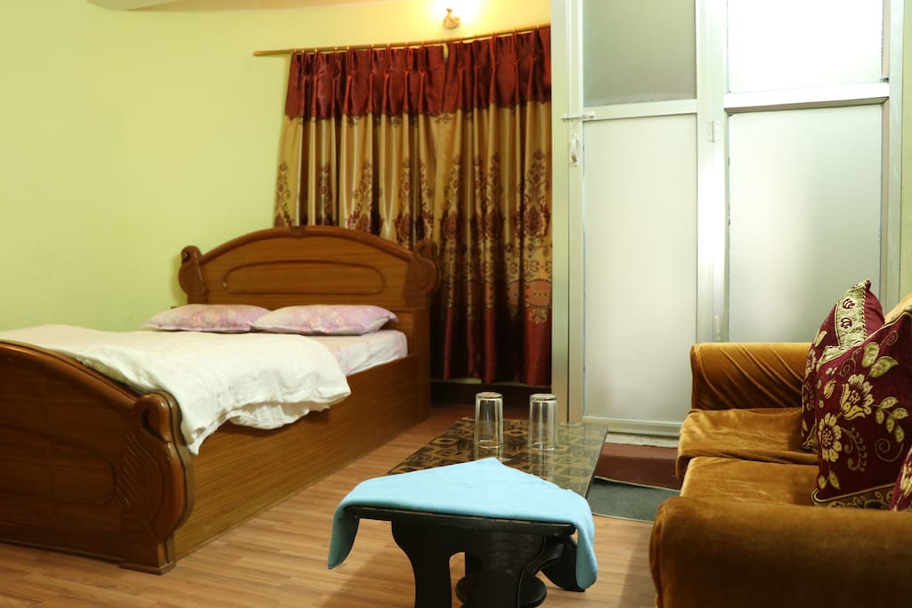 deluxe room with attached bathroom.