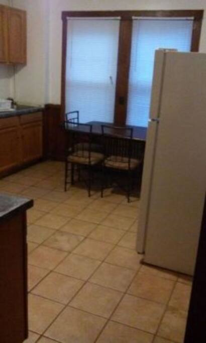 The Kitchen includes
Stove/Oven, Refrigerator, Sink, Toaster, Microwave, Cabinets and 5 Piece Dining Set.