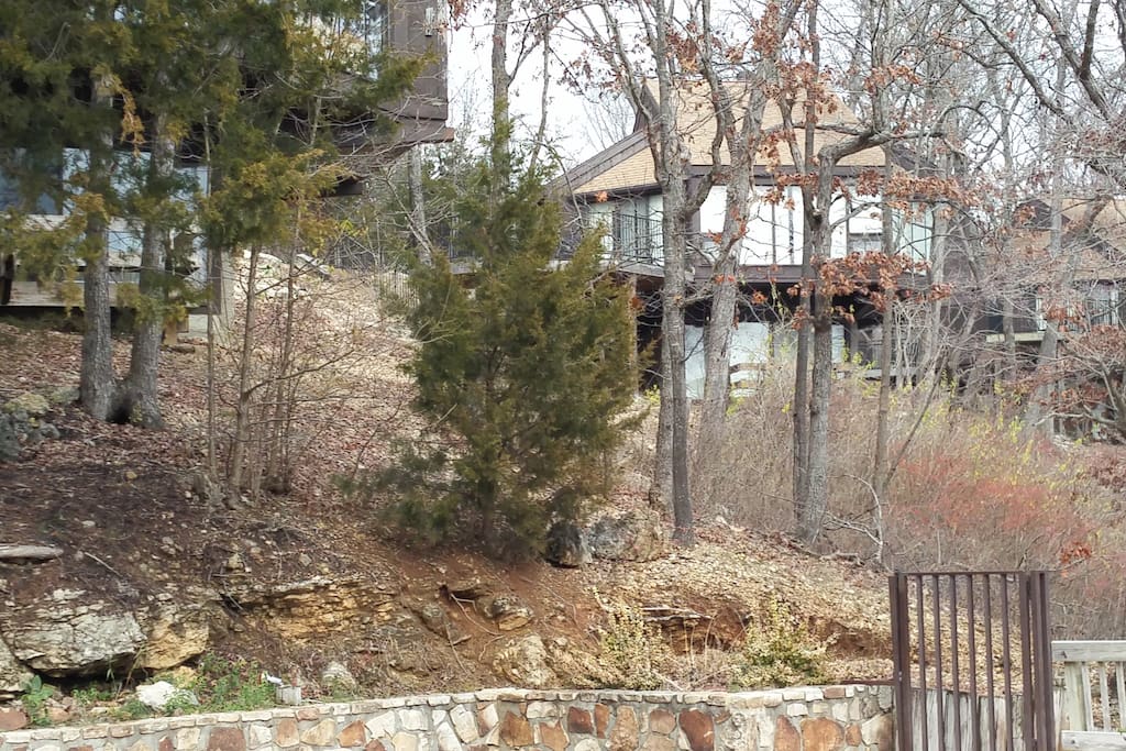 Located in a wooded setting 500 feet from the lake.