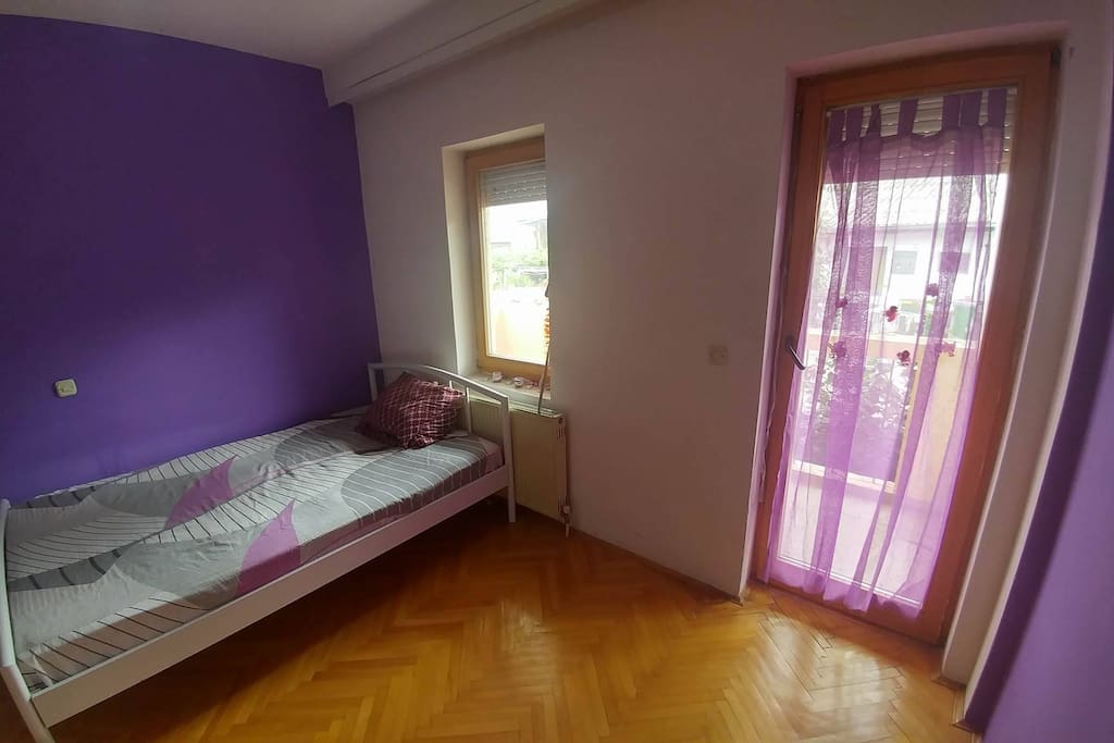 Double bedroom with a balcony