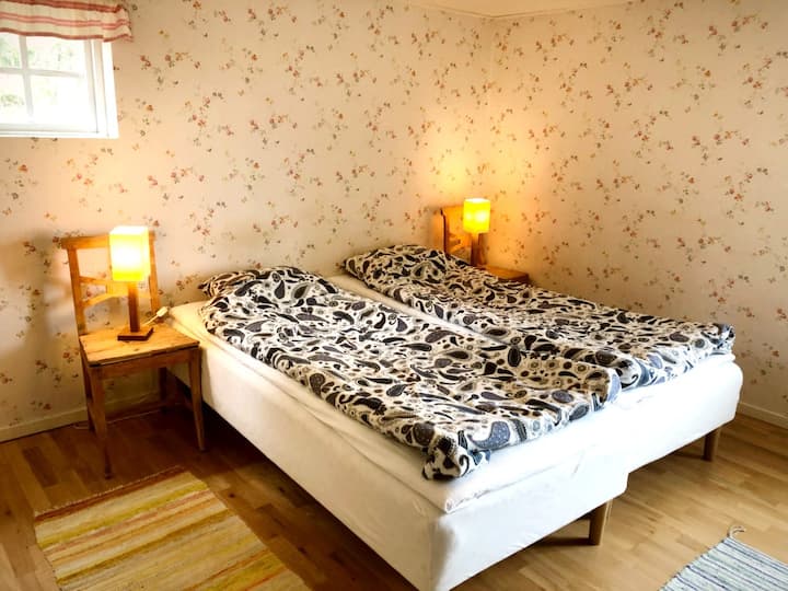 Det större sovrummet