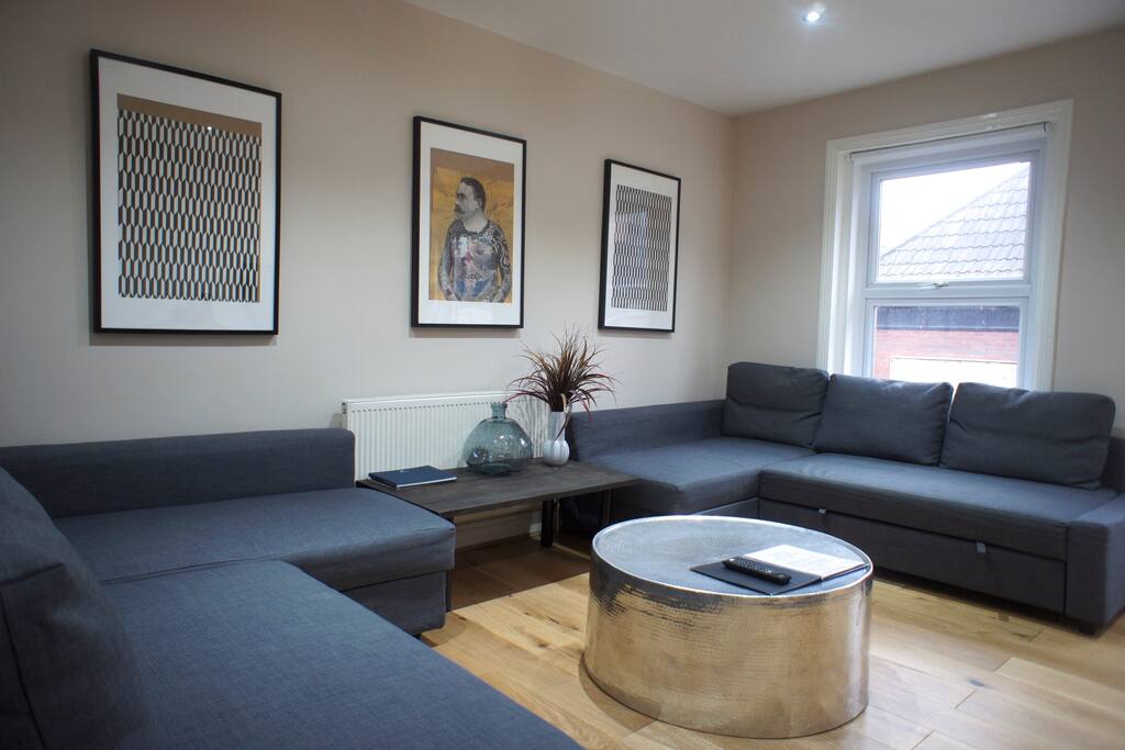 Here's your living room with two double sofa-beds