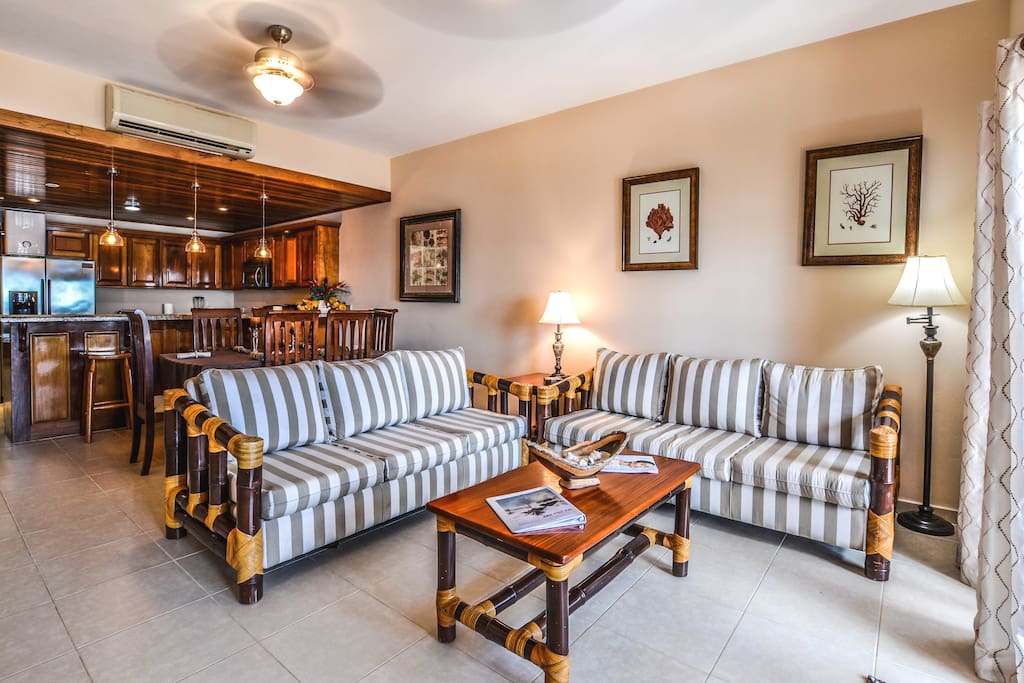 Gorgeous living room with French doors leading to your large beachfront balcony!
