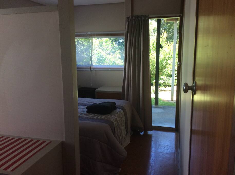 Door outside to table and chairs.