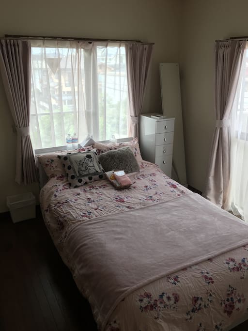 private bed room with semi double bed size 120 width X 200 cm.